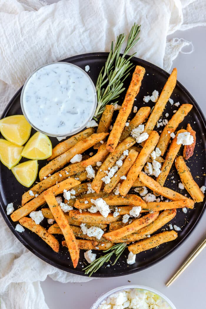 If you're looking for a way to take any french fries recipe to the next level, these feta fries are the recipe you want! The Mediterranean flavors are so fresh and make for the perfect easy appetizer or side dish.