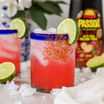 This easy passion fruit margarita is so delicious and easy to make! It's such a fun twist on a classic cocktail recipe and is perfect for summer. Let's up your margarita game and make one! 