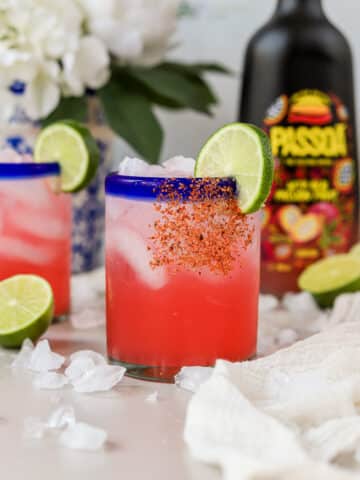 This easy passion fruit margarita is so delicious and easy to make! It's such a fun twist on a classic cocktail recipe and is perfect for summer. Let's up your margarita game and make one! 
