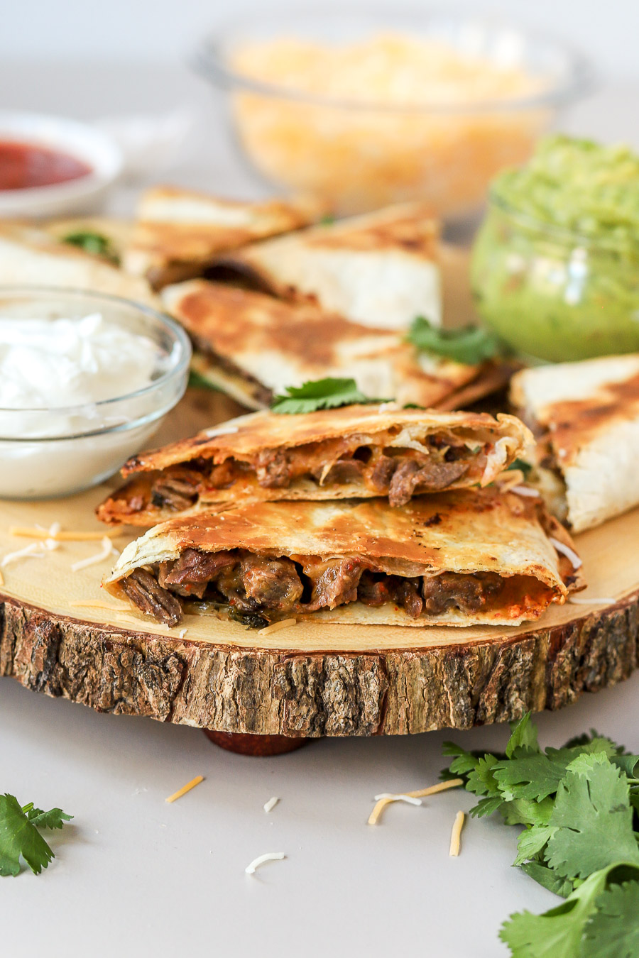 use a pizza cutter to easily slice these carne asada quesadillas.