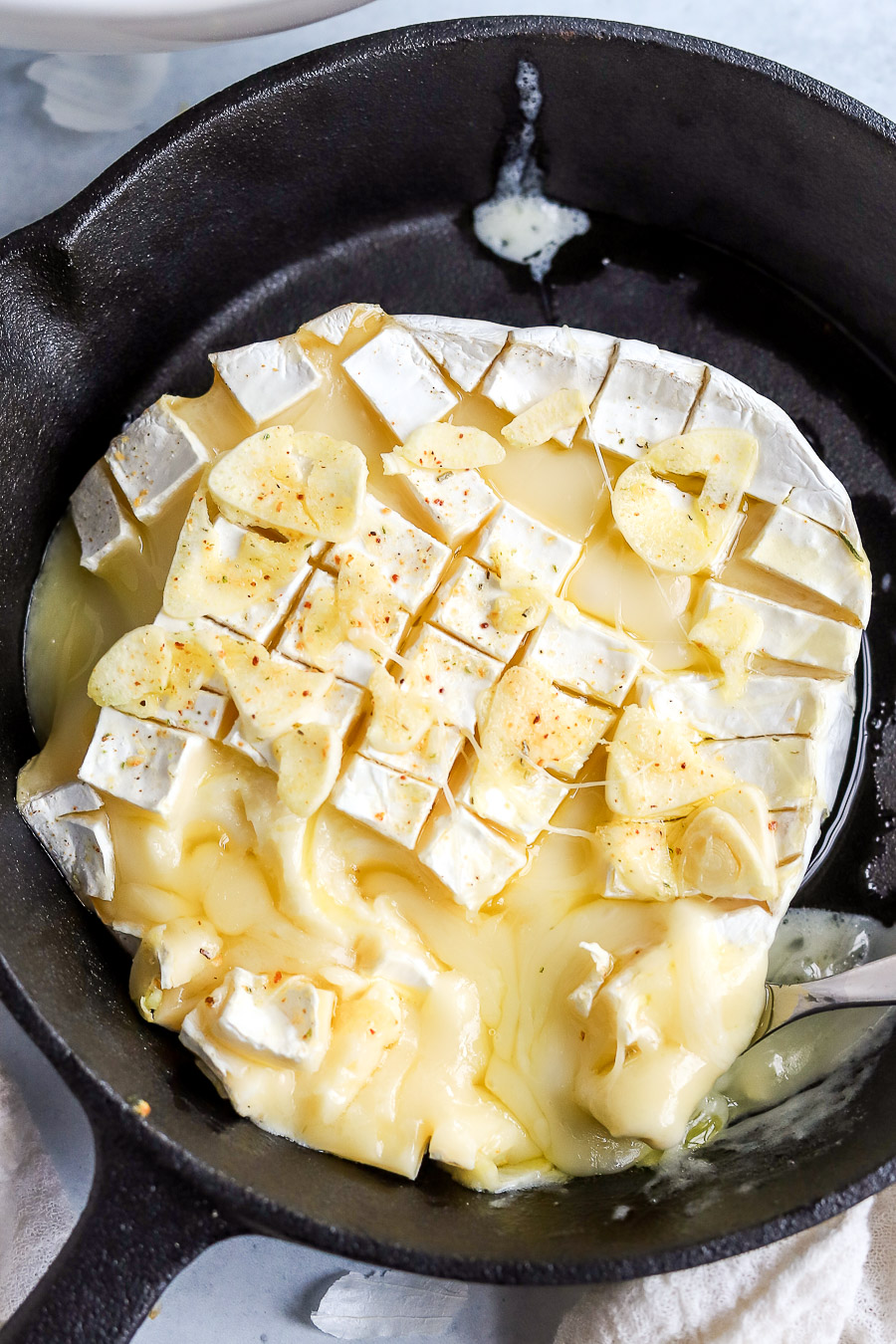 3 Ingredient Baked Brie with Garlic (Easy Appetizer!) bits and bites