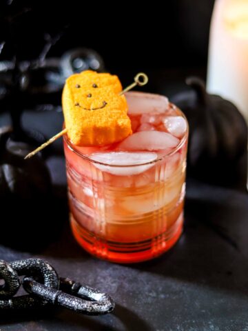 Headless Horseman sour, a Halloween New York sour with bourbon, apple cider, and red wine